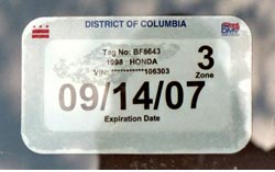 Registration validation sticker for the vehicle and license plate pictured
