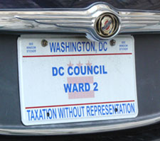 2009 plate marked DC COUNCIL - WARD 2 with a graphic image of the D.C. flag in the background