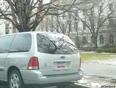 c.2005 OFM Diplomatic license plate displayed on a Ford Freestar.
