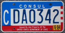 1984 base OFM Consul license plate, late embossed style, no. CDA0302 (assigned to the embassy of Colombia)