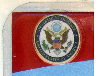 Detail of U.S. Dept. of State seal label on the 2007 OFM base