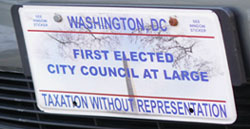 Special plate marked FIRST ELECTED CITY COUNCIL AT LARGE