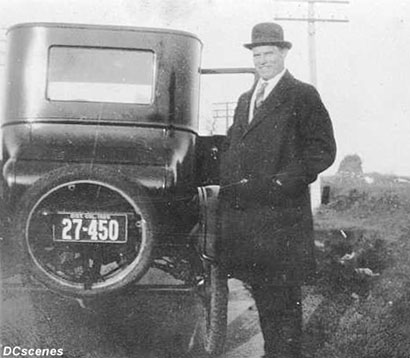 The identity of this gentleman and site of the photo is unknown, but the license plate is a 1925 D.C. issue.