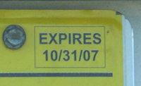Close-up of expiration date legend on 10-31-2007 D.C. dealer plate.