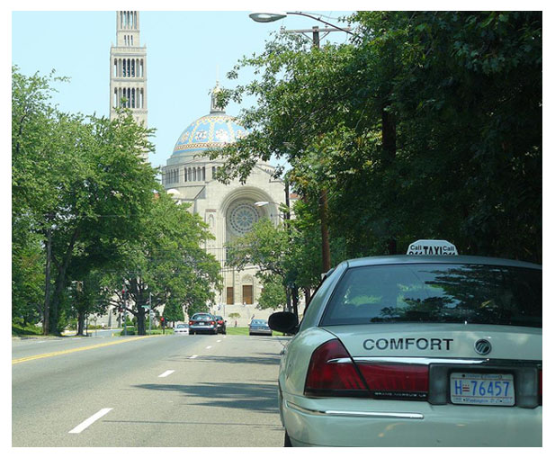 Taxi approaching the Basilica of the National Shrine of the Immaculate Conception