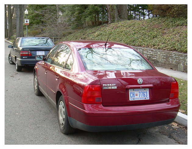 Volvo and Volkswagen with plates CH-7762 and CH-7763, respectively