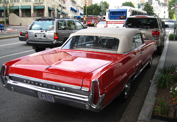 D.C. auto plate no. CN-8262 on a 1964 Pontiac Bonneville convertible parked on Connecticut Ave. NW at Leroy Pl. NW.